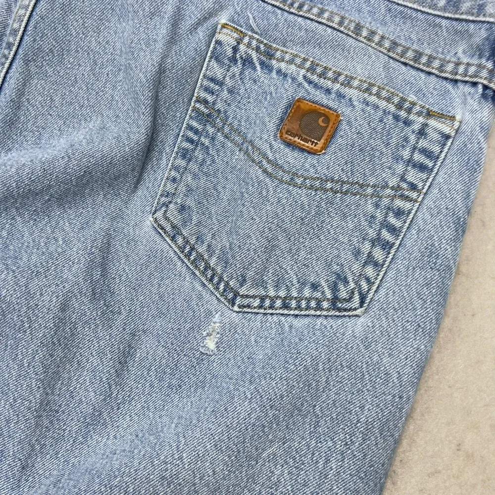 Vintage Carhartt Mens Relaxed Fit Tapered Leg Jeans Light Wash Blue 44x32